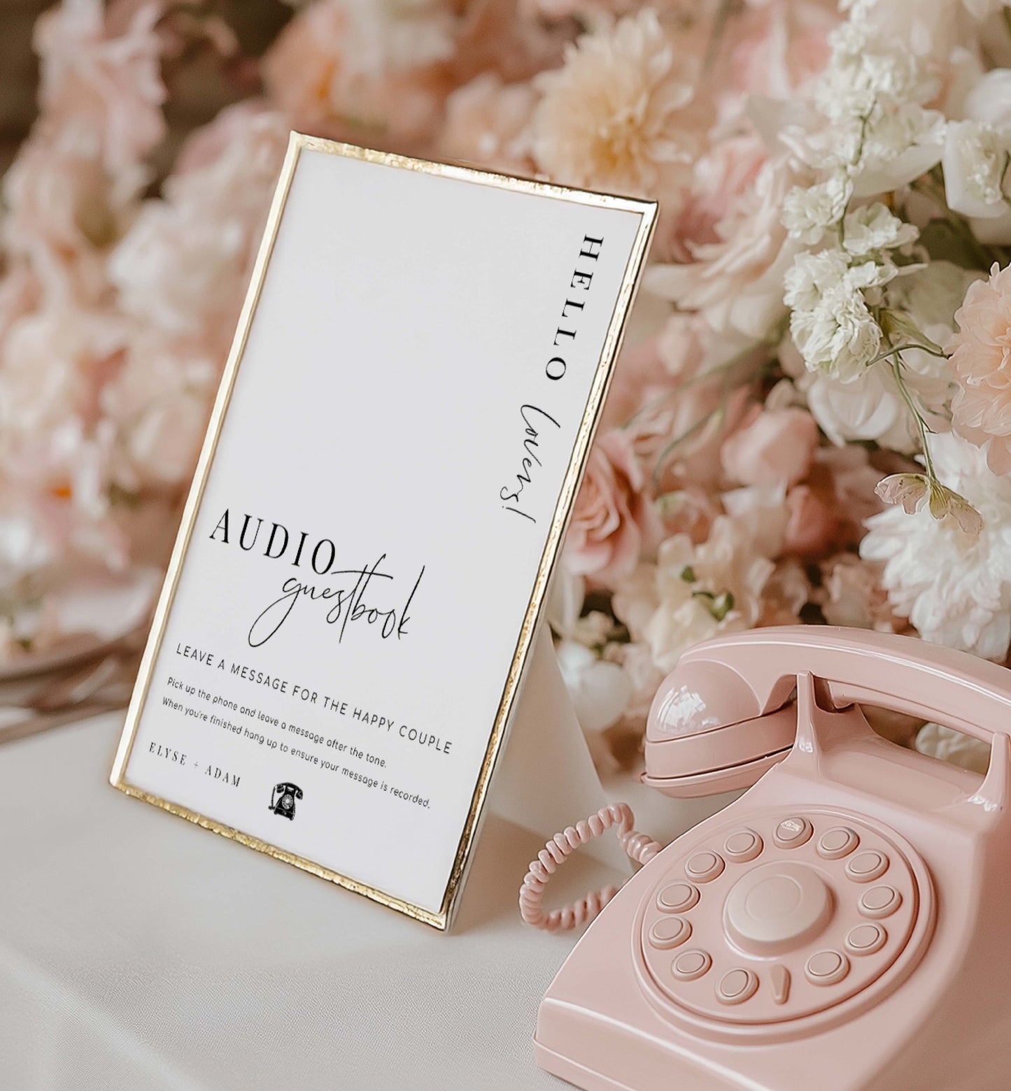 Pink vintage phone with a 'Hello Guest' audio guestbook sign in front of flowers. Printable Audio Guestbook Sign, Modern Minimalist Wedding Guestbook Sign, Audio Booth Sign, Phone Message Guest Book Sign, Estelle