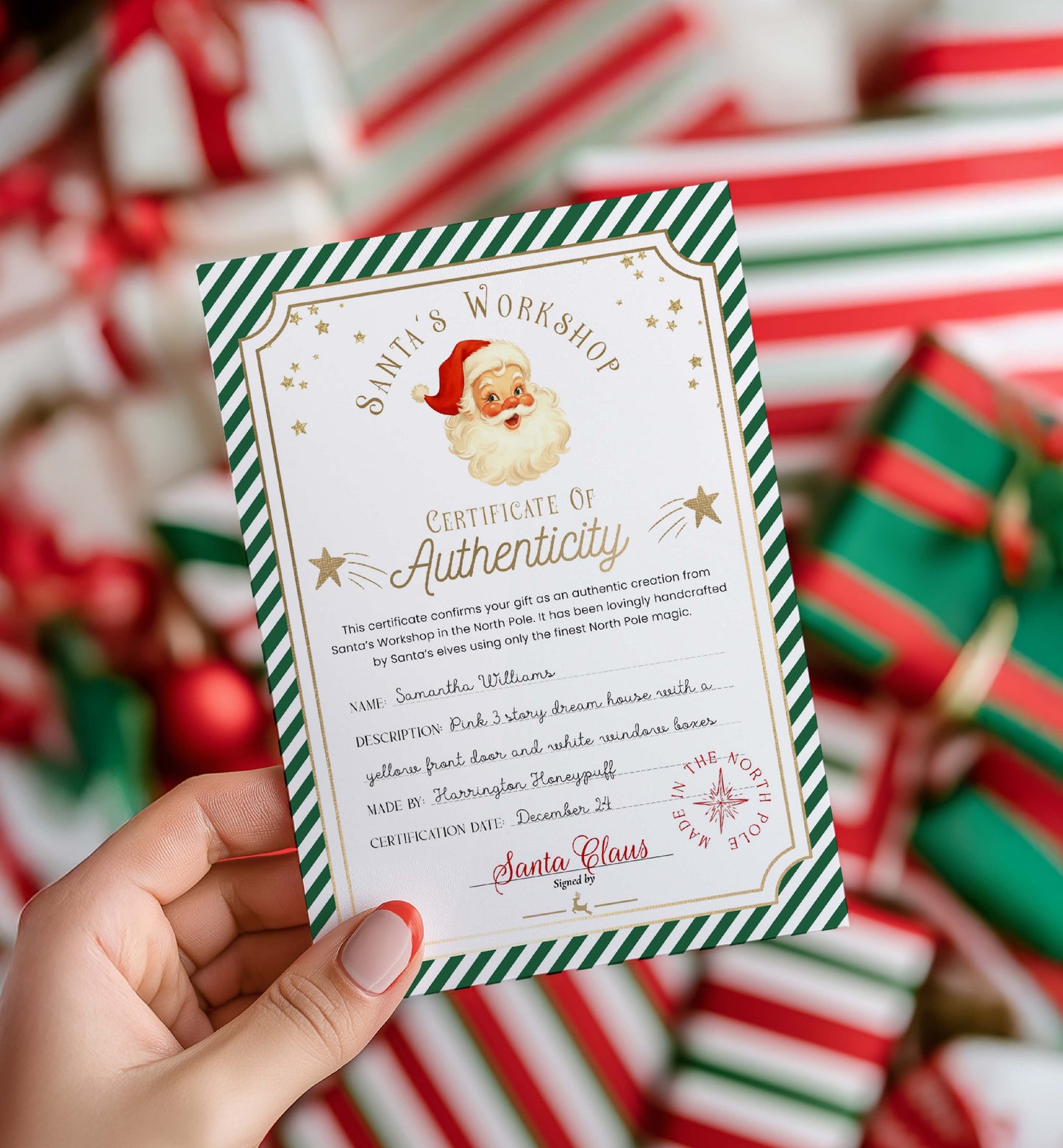 Hand holding a Santa's Workshop Certificate of Authenticity with Christmas-themed background. Printable Santa’s Toy Workshop Certificate of Authenticity, Christmas Eve Box Gift, Kid's Christmas Gift, Made In The North Pole, Stripe