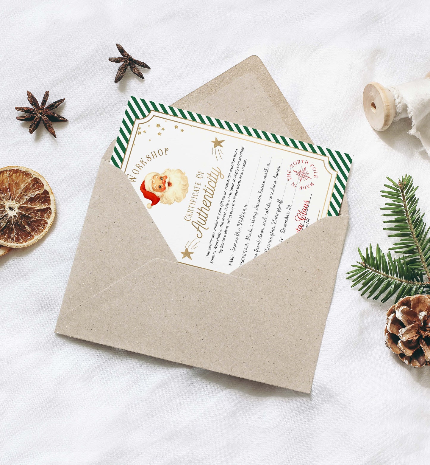 Christmas-themed invitation card with Santa Claus in a brown envelope surrounded by festive decorations on a white background. Printable Santa’s Toy Workshop Certificate of Authenticity, Christmas Eve Box Gift, Kid's Christmas Gift, Made In The North Pole, Stripe