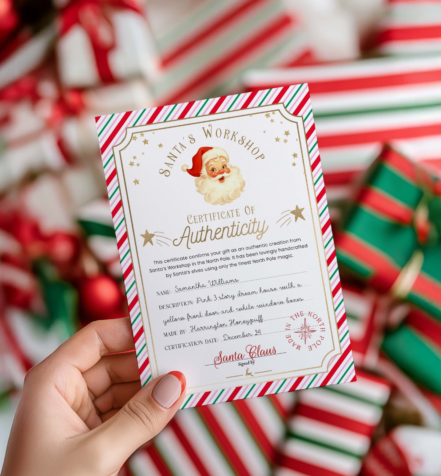Certificate of Authenticity held by a hand with Christmas-themed background. Printable Santa’s Toy Workshop Certificate of Authenticity, Christmas Eve Box Gift, Kid's Christmas Gift, Made In The North Pole, Stripe