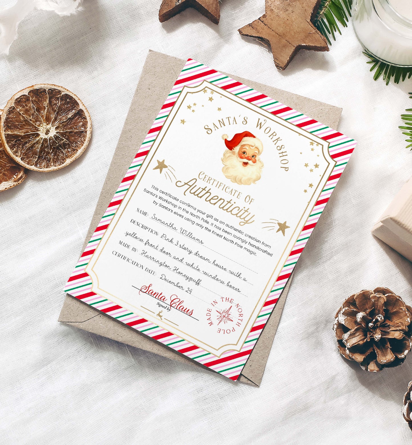 Certificate of Authenticity from Santa's Workshop on a decorative surface with Christmas elements. Printable Santa’s Toy Workshop Certificate of Authenticity, Christmas Eve Box Gift, Kid's Christmas Gift, Made In The North Pole, Stripe
