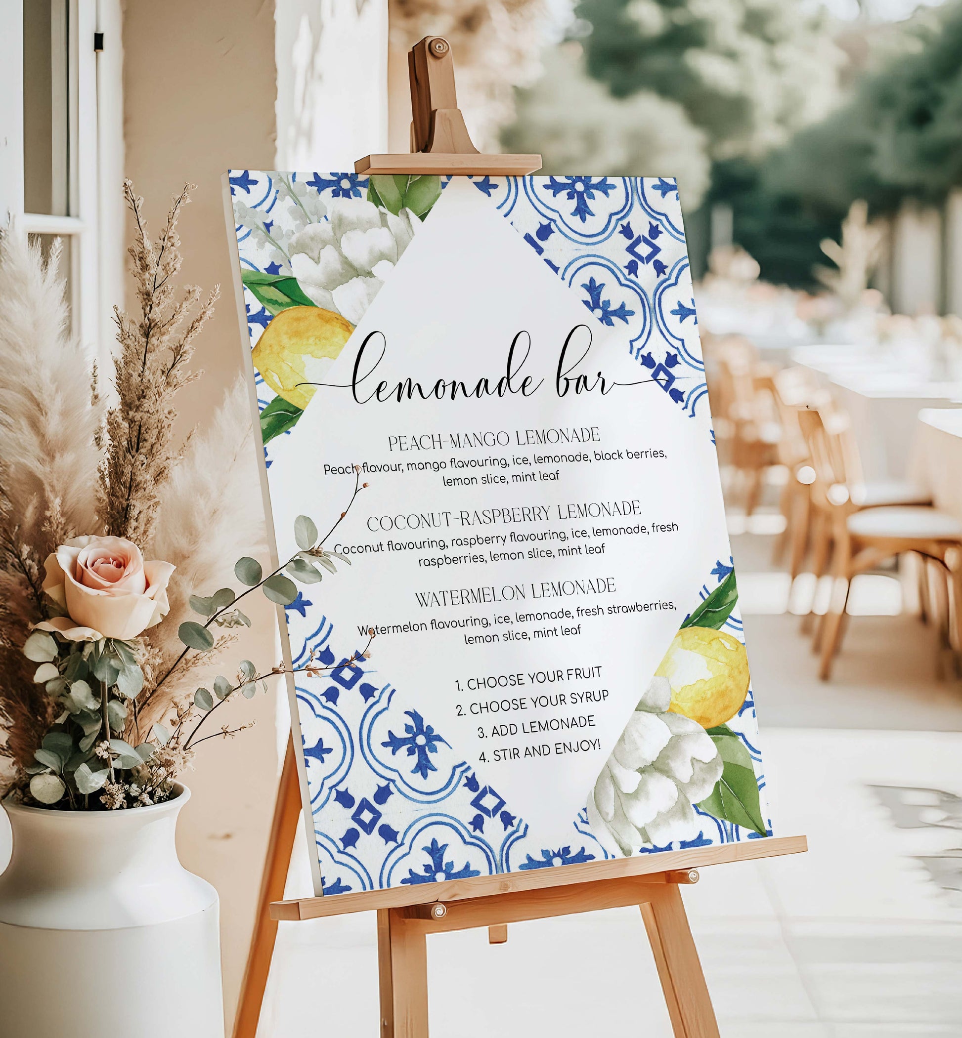 Lemonade bar sign with floral design on an easel outdoors. Lemonade Bar Sign, Mediterranean Blue Tile Lemons, Printable Bridal Shower Bar Sign, Wedding Bar Sign, Italian Theme, Capri, Mocktail Bar Menu, The Med