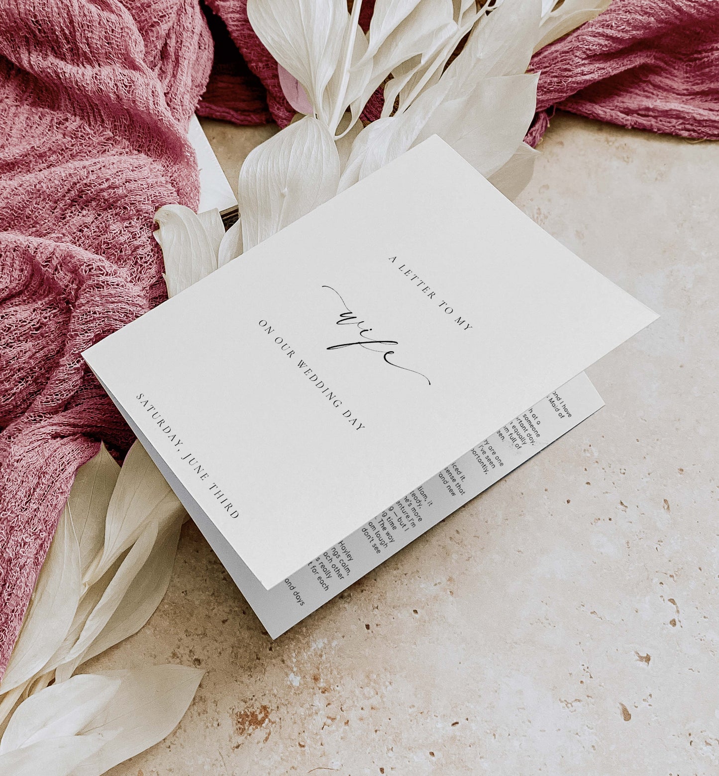 Wedding invitation card on a textured surface with pink fabric and white. Printable Wedding Vow Books, A Letter To My Husband Wedding Day Card Template, Minimalist Wedding, Bride and Groom Vows Card, Ellesmere