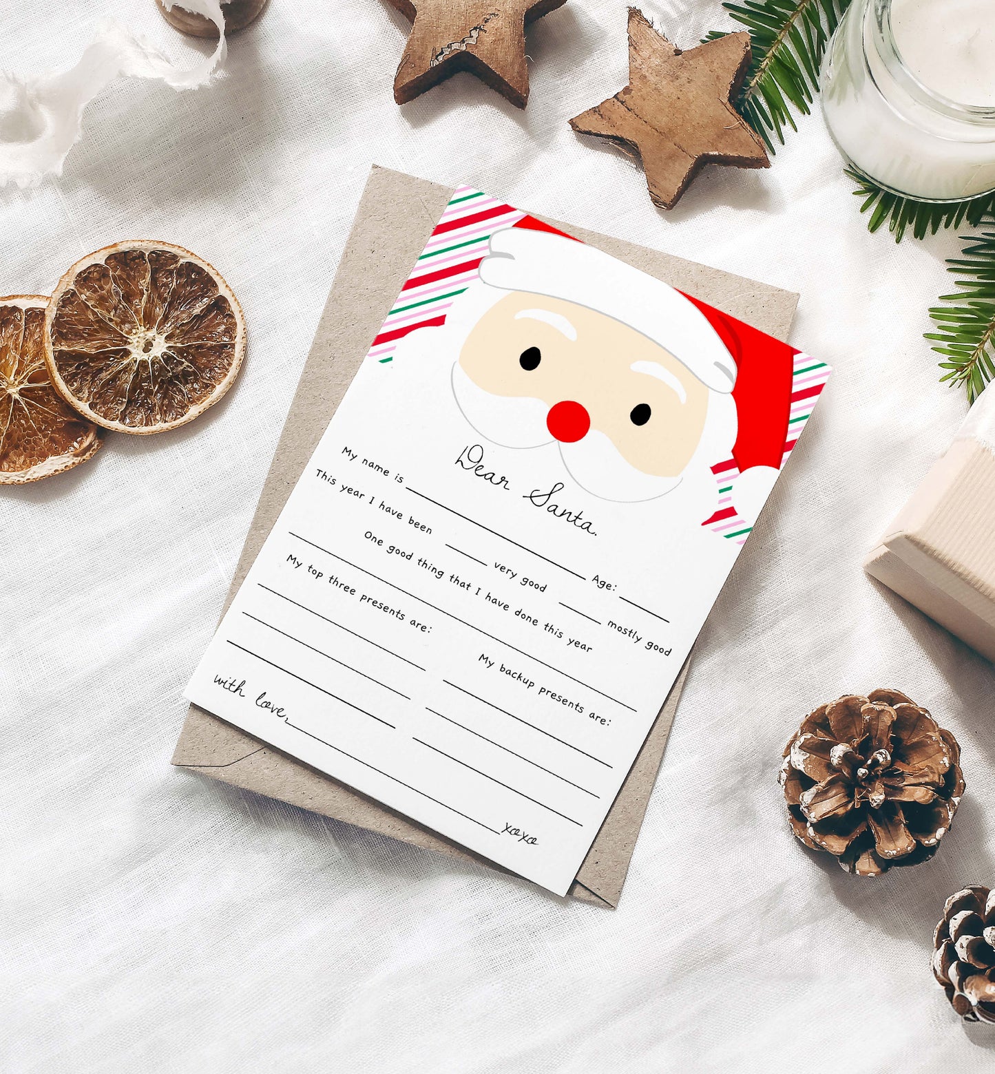 Letter to Santa Claus with a cartoon face on a white surface with Christmas decorations. Printable Letter To Santa Template, Christmas Eve Mail for Kids, Children's Christmas Wish List, Dear Santa Christmas Letter, Stripe Pink
