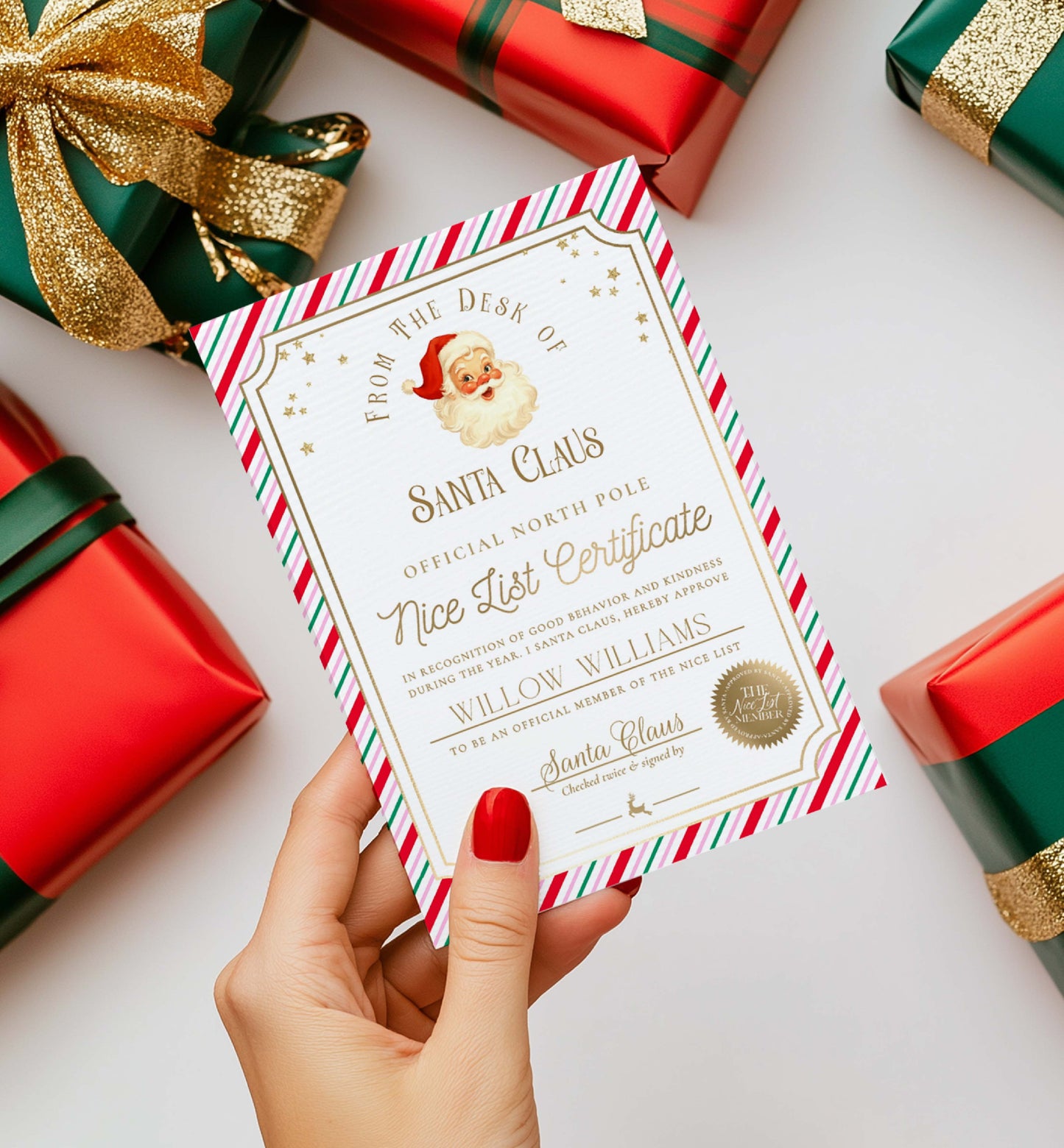 Hand holding a 'Nice List Certificate' from Santa Claus with Christmas presents in the background. Printable Nice List Certificate Template, Approved Nice List Member Letter From Santa Claus, North Pole Mail Christmas Nice List, Stripe