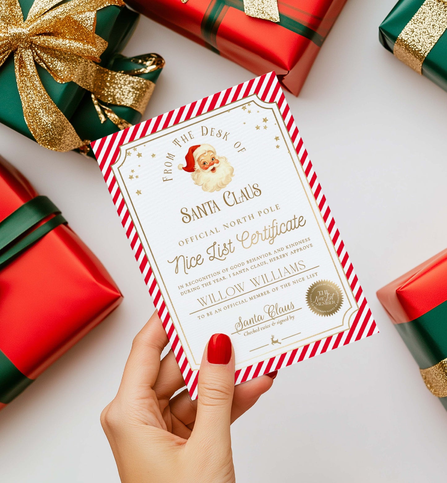 Hand holding a 'Santa Claus' certificate with Christmas presents in the background. Printable Nice List Certificate Template, Approved Nice List Member Letter From Santa Claus, North Pole Mail Christmas Nice List, Stripe Red