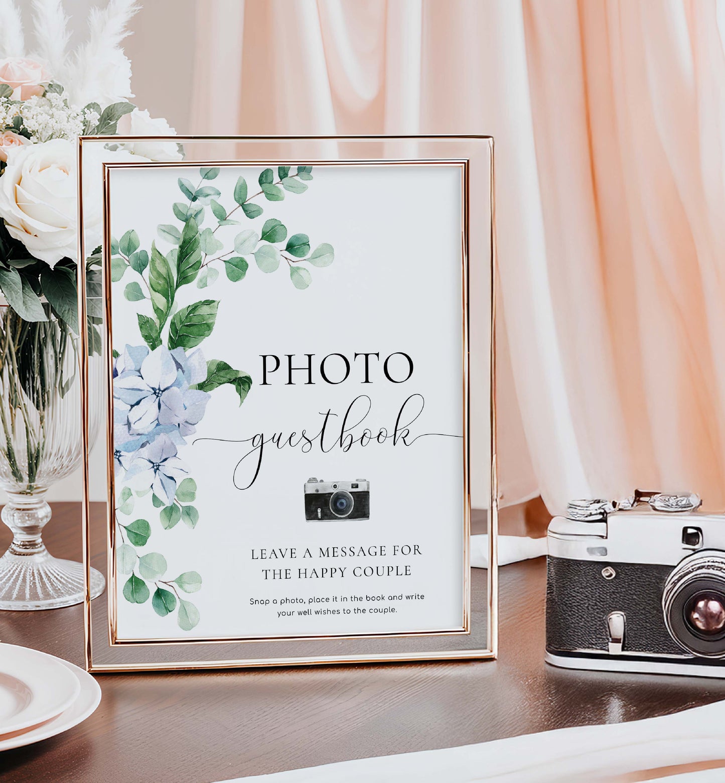 Framed photo guestbook with floral design on a table with a vintage camera. Photo Guestbook Sign, Blue Hydrangea Floral, Wedding Guest Book Sign, Polaroid Guest Book Sign, Wedding Keepsake Guestbook Sign, Ferras