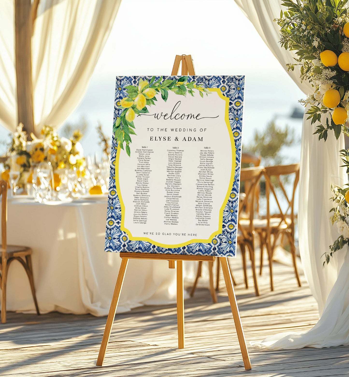 Wedding seating chart with decorative frame on an easel outdoors. Printable 3 Long Tables Wedding Seating Chart Template, Positano Blue Tile Lemon, Seating Table Plan Poster, Reception Seating Sign