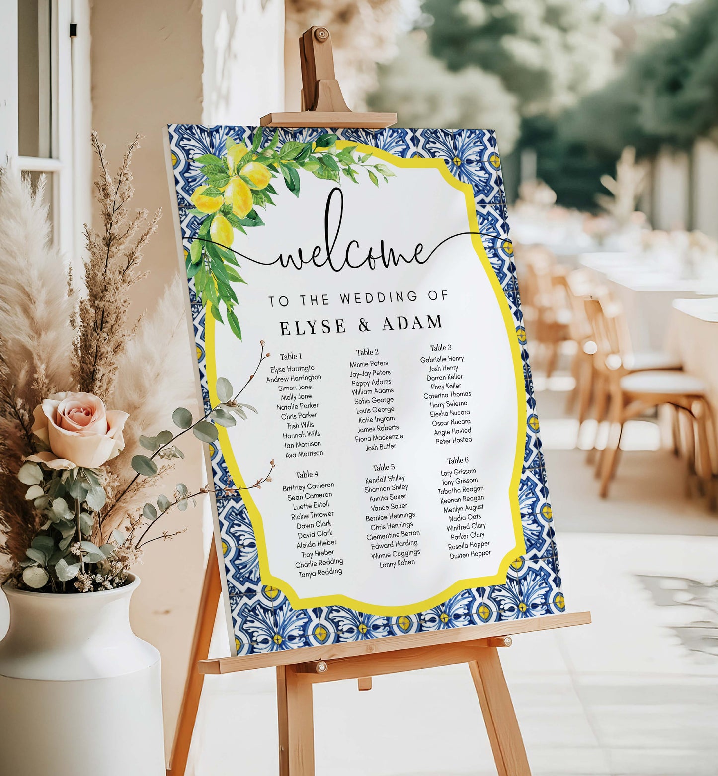 Wedding welcome sign with floral design on an easel in a decorated room. Printable Seating Chart Template, Positano Blue Tile Lemon Wedding Table Plan, Italian Theme, Seating Plan Poster, Guest List Seating Sign