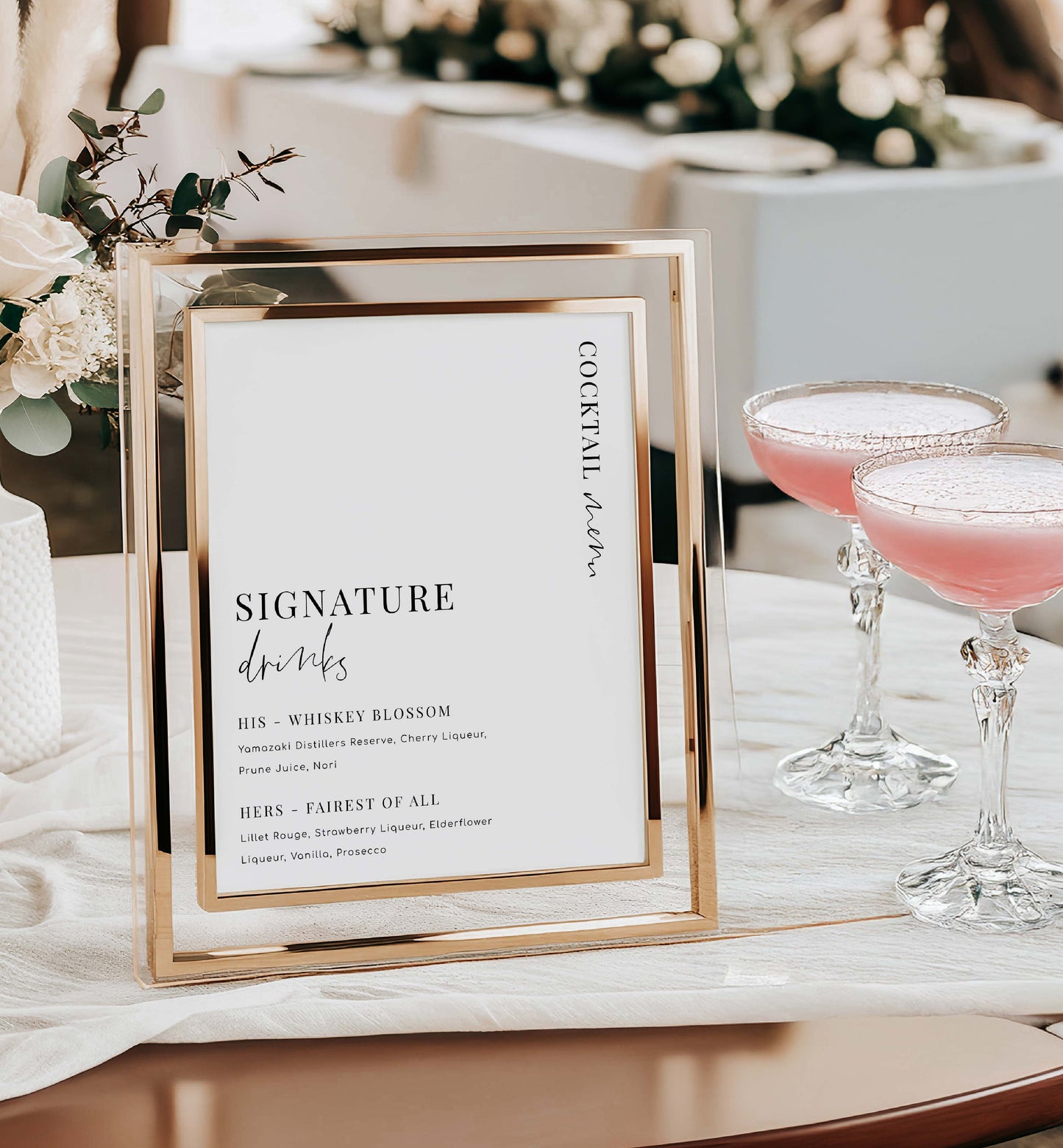 Gold-framed cocktail menu on a table with pink drinks and floral decorations. Signature Drinks Sign, Minimalist Wedding Signature Cocktails Sign, Printable His and Her Drinks Menu Sign, Wedding Bar Menu Sign, Estelle