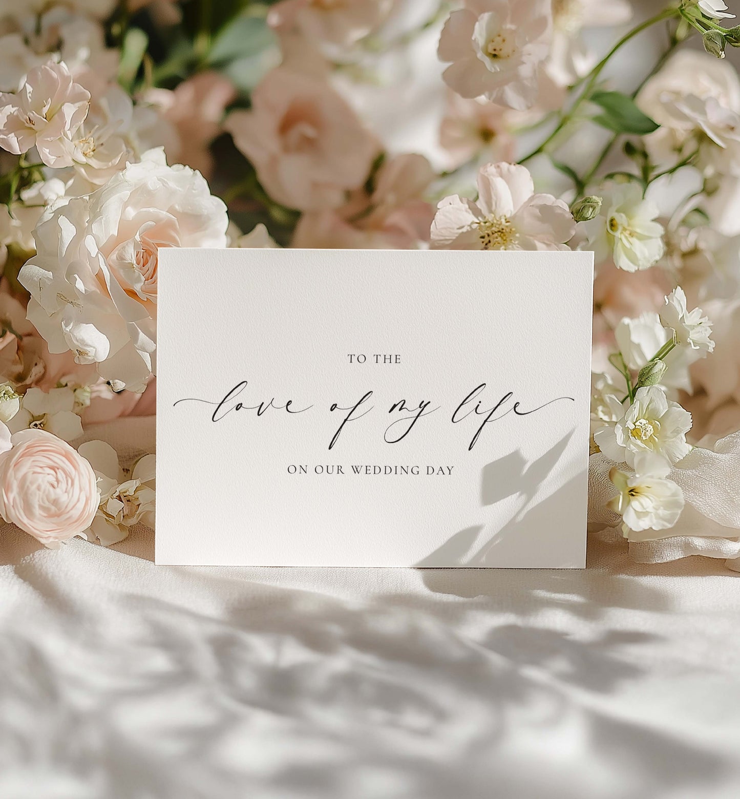 Card with 'To the love of my life on our wedding day' text surrounded by flowers. To The Love Of My Life Wedding Day Card, Bride & Groom Wedding Day Card, Husband and Wife Wedding Day Card, Ellesmere