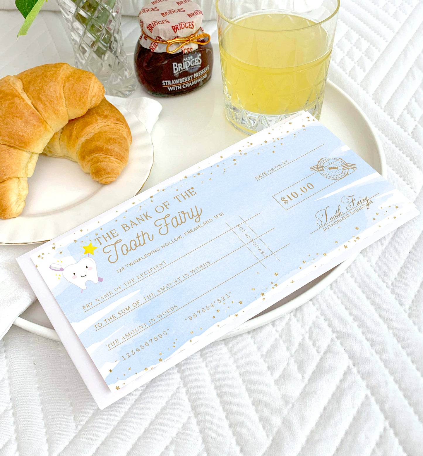 Check from 'The Bank of the Tooth Fairy' on a breakfast tray with croissants and juice. Printable Tooth Fairy Cheque, Tooth Fairy Money Voucher, Tooth Fairy Payment Certificate, Lost Tooth Gift Voucher, Coupon, Blue Watercolor