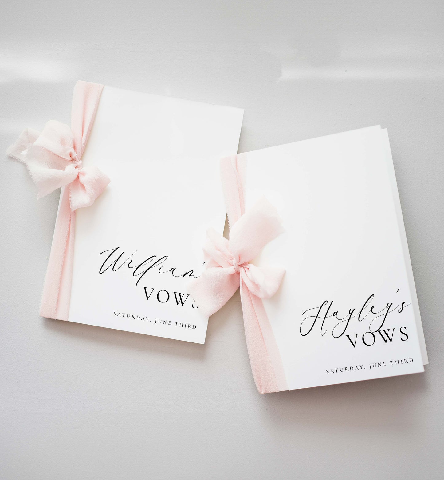 Two vow books with pink ribbons on a light gray background. Printable His And Her Vow Books, Bride and Groom Wedding Day Card Template, Minimalist Wedding Vows Card, Wedding Ceremony Card Ellesmere