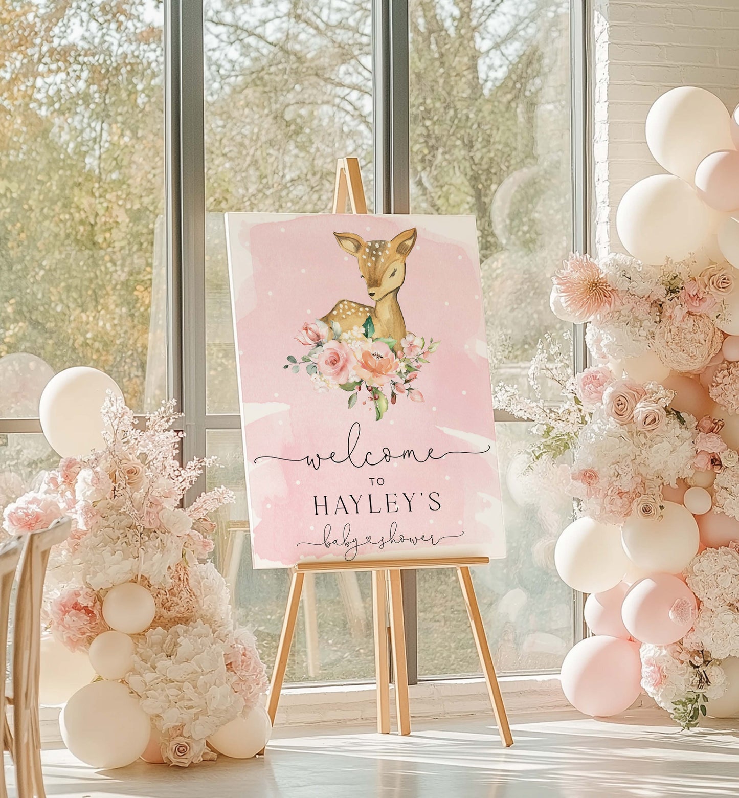 Decorative setup for a baby shower with floral arrangements and a 'welcome' sign. Printable Welcome Sign, Oh Deer Baby Shower Welcome Sign, Woodland Animals Girl Baby Shower, Oh Deer A Baby Girl Is Almost Here, Pink
