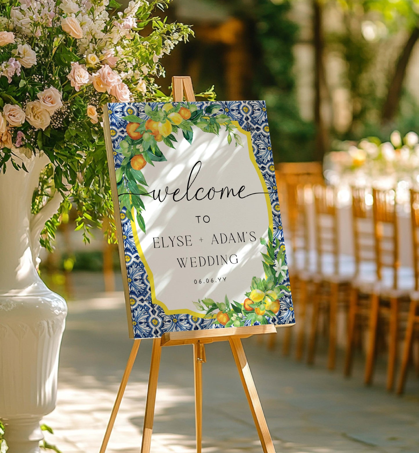 Wedding welcome sign on an easel with floral decorations and chairs in the background. Printable Welcome Sign, Positano Blue Tile, Italian Oranges Lemons, Printable Wedding Sign, Bridal Shower Welcome Sign, Baby Shower Sign