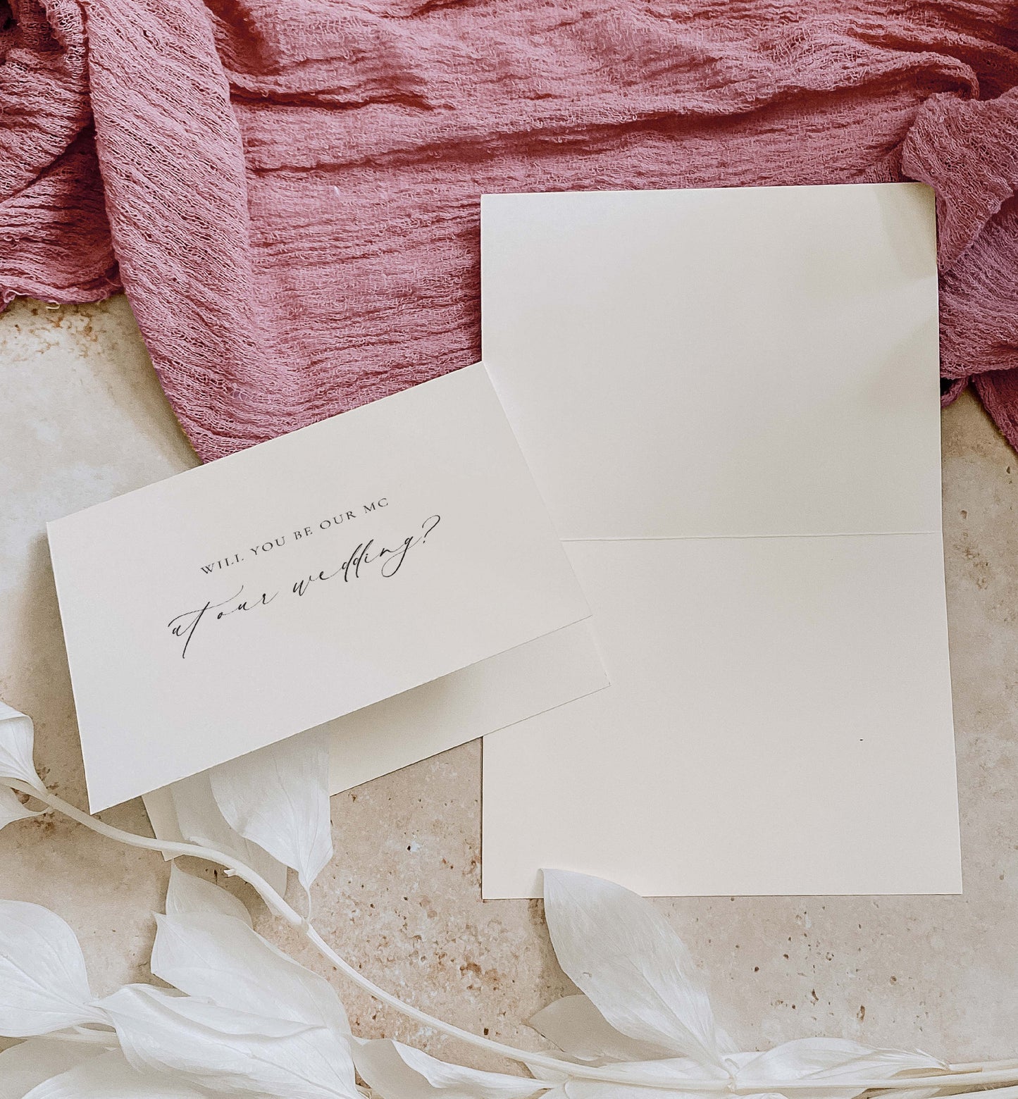Invitation card with 'Will you be our MC?' text on a textured surface with pink fabric and white flowers. Will You Be Our MC Card, Wedding MC Proposal Card, Minimalist Wedding Card, Wedding Proposal Card, Off White Ivory, Ellesmere