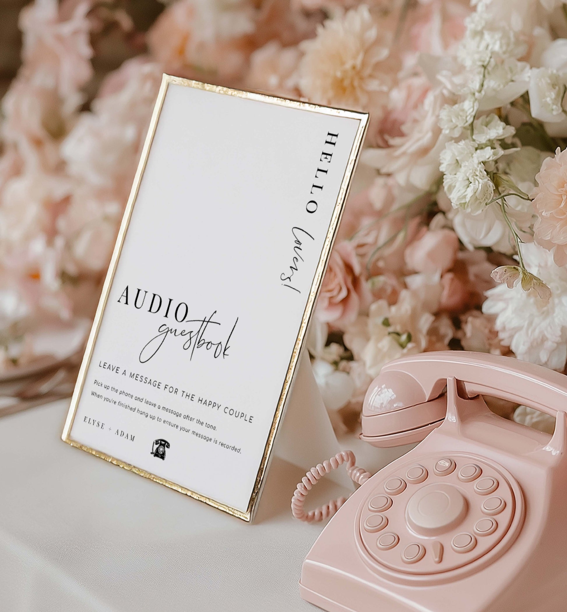 Pink vintage phone with a 'Hello Guest' audio guestbook sign in front of flowers. Printable Audio Guestbook Sign, Modern Minimalist Wedding Guestbook Sign, Audio Booth Sign, Phone Message Guest Book Sign, Estelle