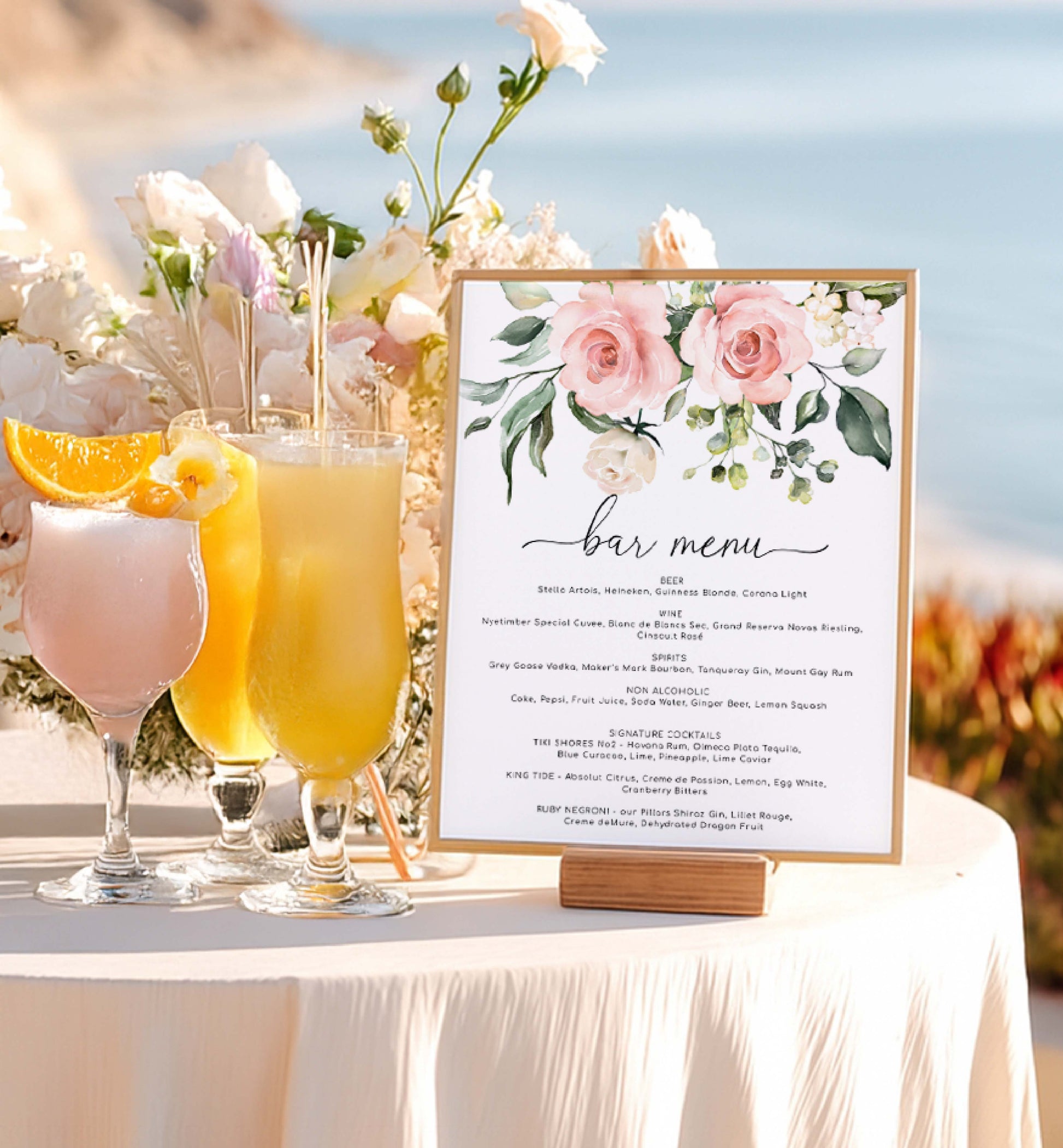 Bar menu sign with floral design next to cocktails on a table outdoors. Printable Bar Menu Sign, Blush Floral Wedding Drinks Menu Sign, Bridal Shower Drinks Menu Sign, Baby Shower Drinks Sign, Darcy Floral Pink