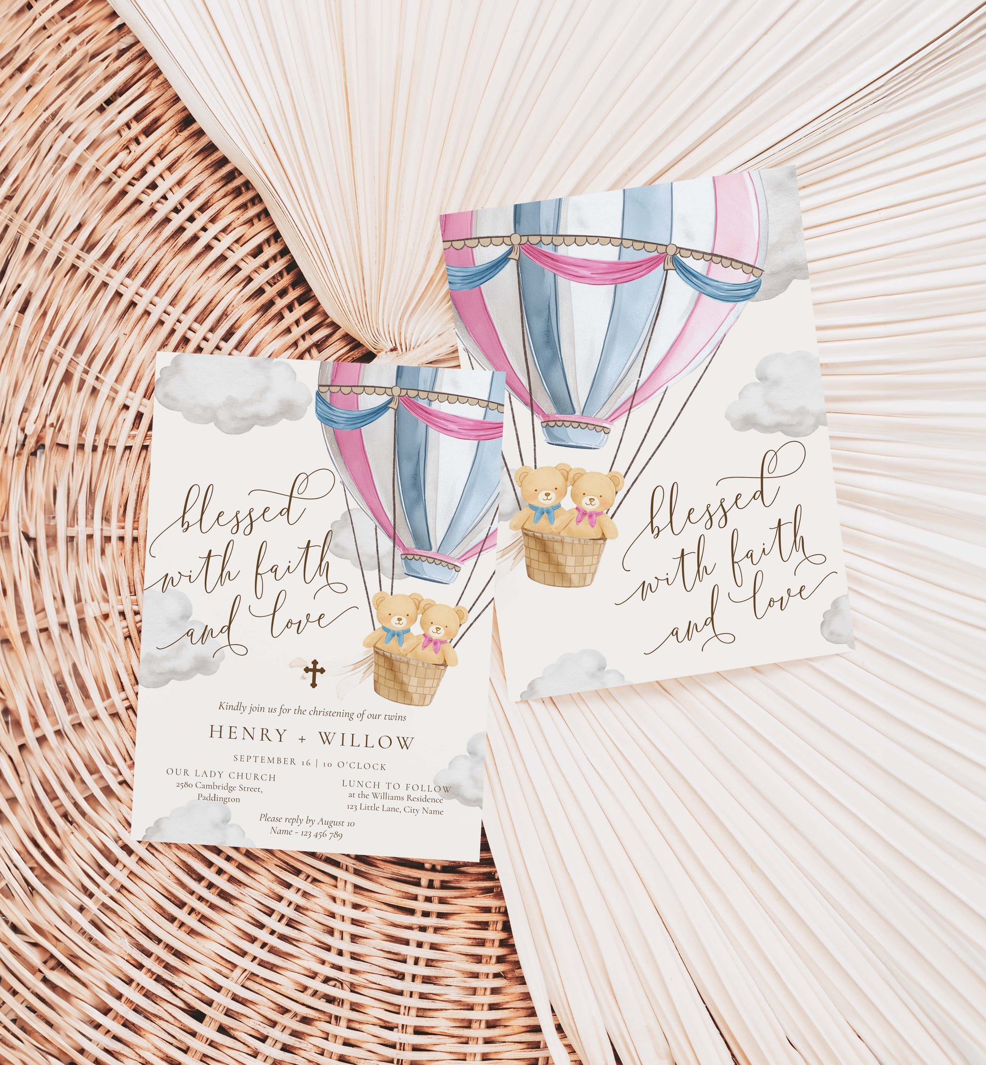 Two cards with hot air balloon designs and text on a woven surface. Twins Christening Printable Invitation Template: Pink & Blue Teddy Bear Hot Air Balloon, Boy/Girl Baptism