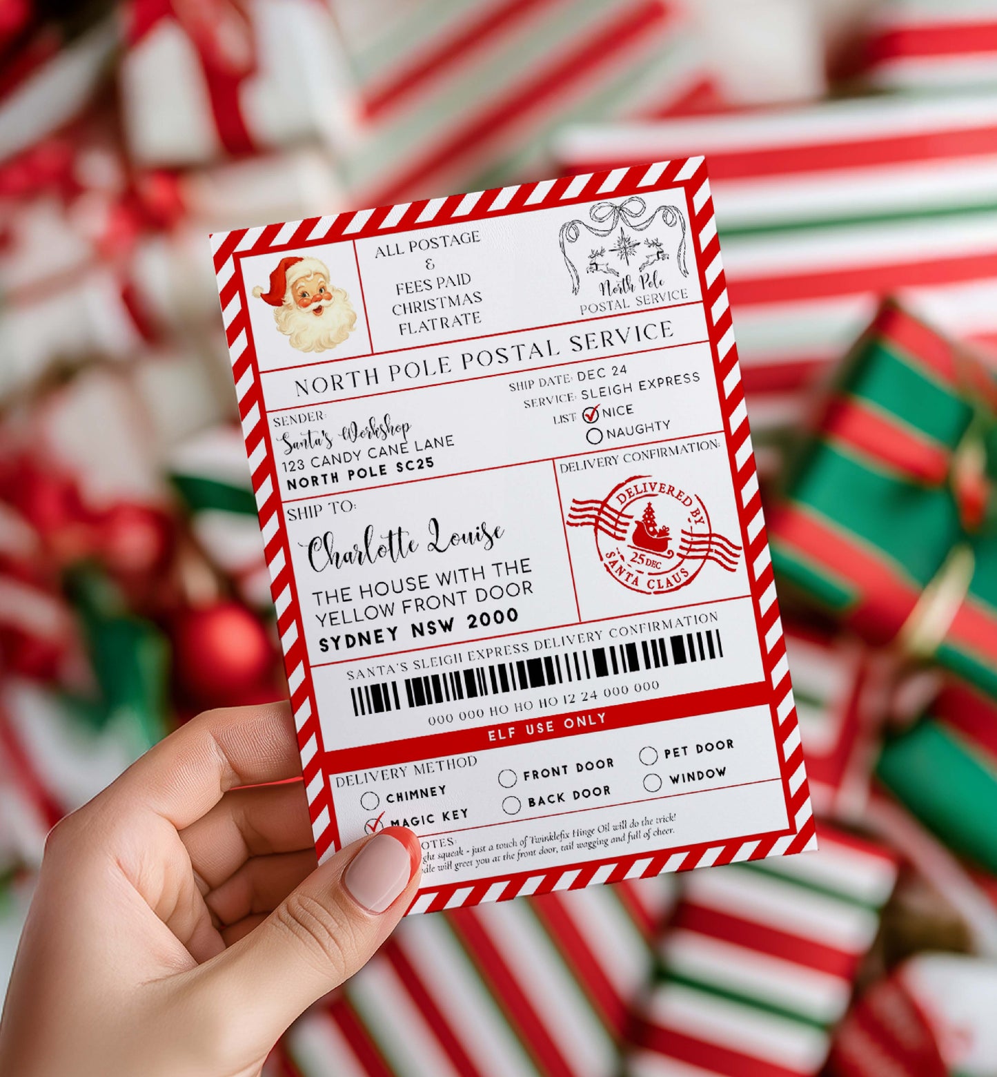 Hand holding a Santa Claus letter with a North Pole Postal Service design against a festive background. Printable Santa Mail North Pole Shipping Label Sticker, Christmas Special Delivery Shipping Label Template, Christmas Santa Gift Tag