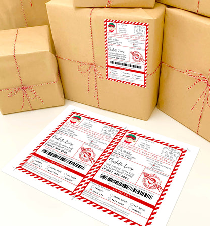 Brown paper packages tied with red string on a white surface, with a matching label. Printable Elf Arrival Box Shipping Label Sticker, North Pole Elf Mail Gift Tag, Santa's Workshop Christmas Special Delivery Shipping Label