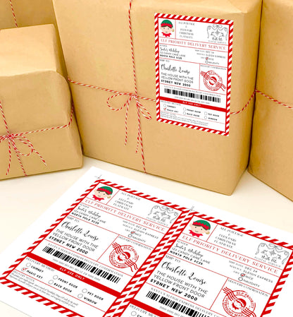 Brown paper packages tied with red string on a white surface with matching labels. Printable Elf Arrival Box Shipping Label Sticker, North Pole Elf Mail Gift Tag, Santa's Workshop Christmas Special Delivery Shipping Label
