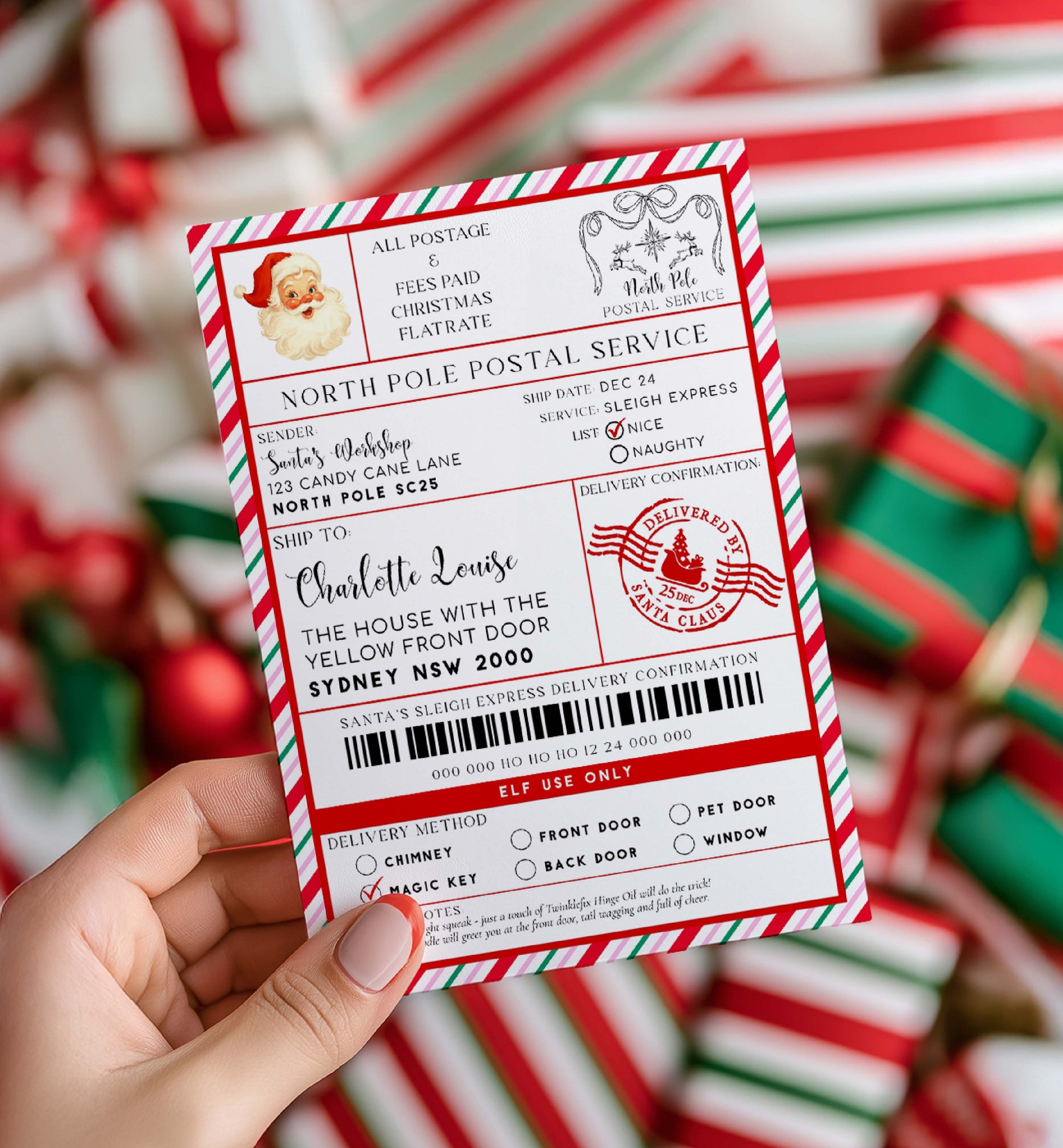 Hand holding a festive Christmas-themed letter with Santa Claus on a blurred candy cane background. Printable Santa Mail North Pole Shipping Label Sticker, Christmas Special Delivery Shipping Label Template, Christmas Santa Gift Tag