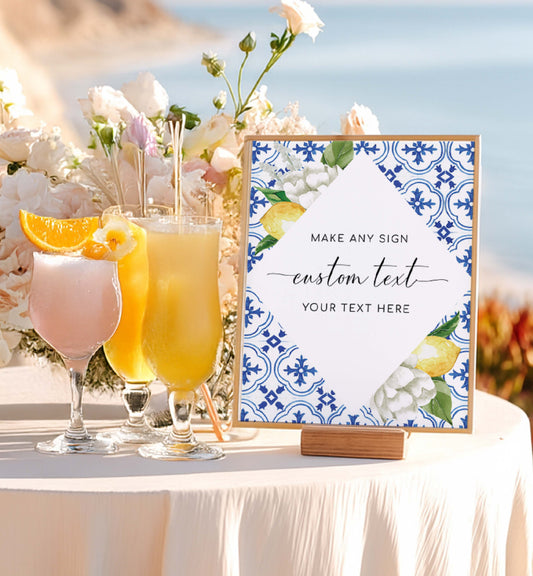 Three colorful cocktails on a table with a decorative sign in the background. Printable Custom Text Sign Template - Mediterranean Blue Tile Lemons - Editable Wedding Sign - Bridal Shower Sign - Baby Shower Sign - The Med