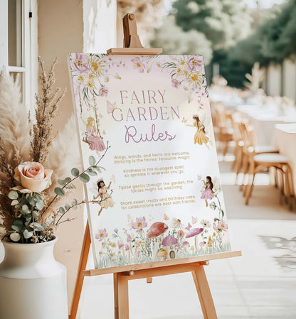 Fairy garden-themed sign on an easel with decorative elements in a garden setting. Fairy Garden Rules Sign Printable, Girls Fairy Birthday Party Decoration Sign