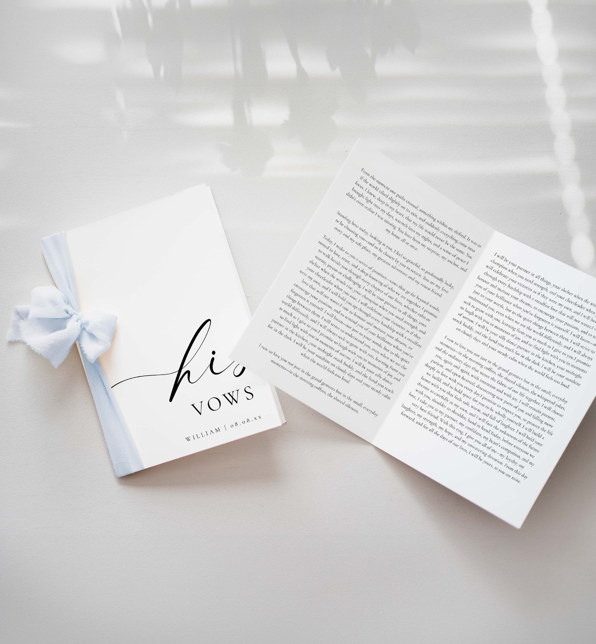 Open book titled 'his vows' with a white ribbon on a light background. Printable His And Her Vow Books, Bride and Groom Wedding Day Card Template, Minimalist Wedding Vows Card, Wedding Ceremony Card Ellesmere