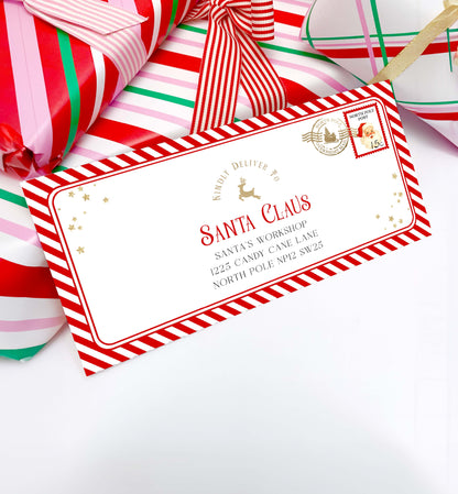 Decorative envelope with Santa Claus address on a white background with candy canes. Printable Letter To Santa Envelope, Santa North Pole Mail Envelope Template, Christmas Eve Box Santa Letter, Red Stripe