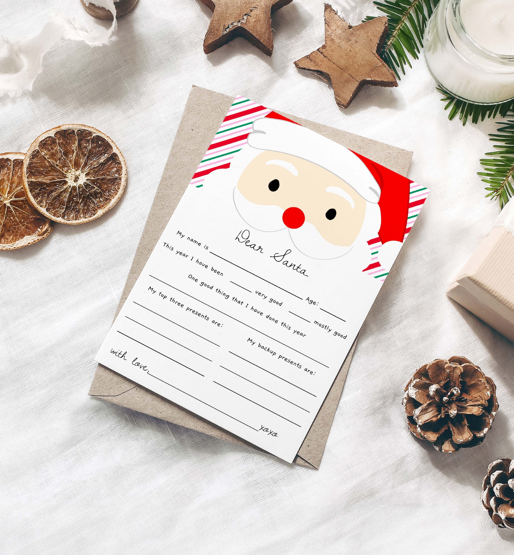 Letter to Santa Claus with a cartoon face on a white surface with Christmas decorations. Printable Letter To Santa Template, Christmas Eve Mail for Kids, Children's Christmas Wish List, Dear Santa Christmas Letter, Stripe Pink