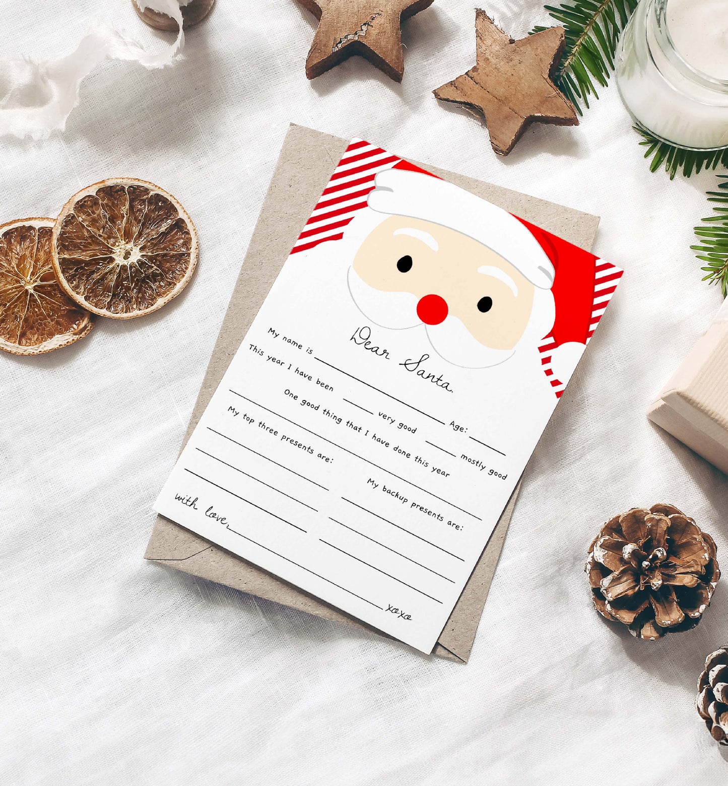 Letter to Santa Claus with decorative items on a white surface. Printable Letter To Santa Template, Christmas Eve Mail for Kids, Children's Christmas Wish List, Dear Santa Christmas Letter, Stripe Red