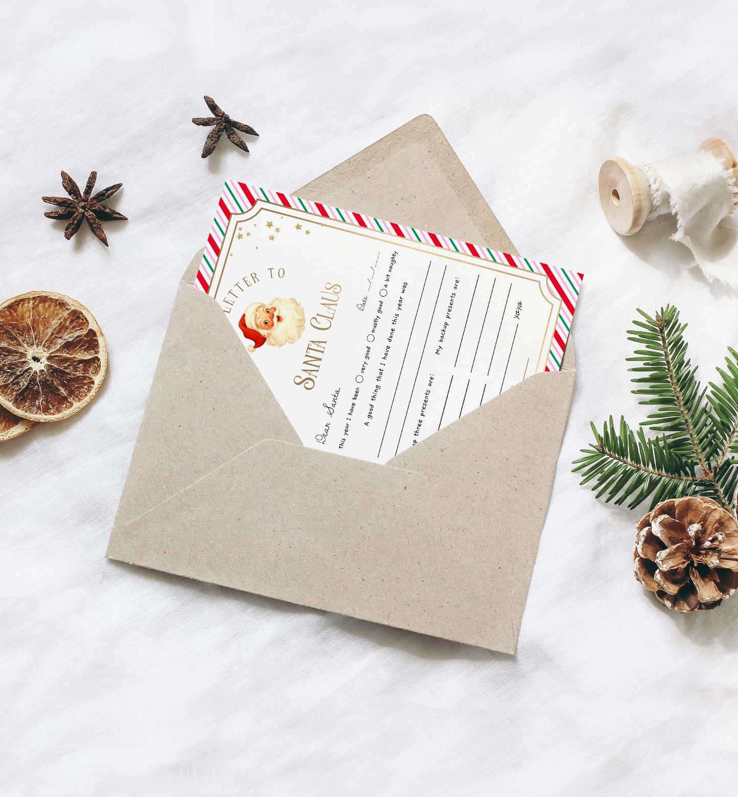 Letter to Santa Claus inside a brown envelope on a white background with decorative elements. Printable Letter To Santa Template, Christmas Eve Mail for Kids, Children's Christmas Wish List, Dear Santa Christmas Letter, Stripe Pink