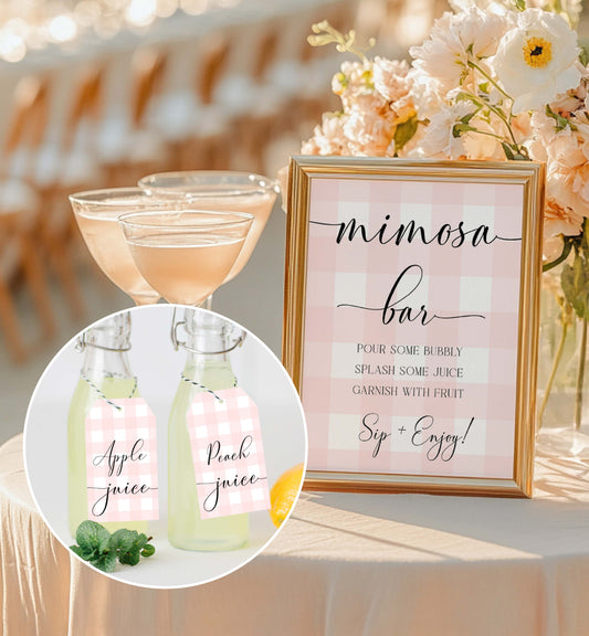 Mimosa bar setup with glasses, bottles labeled 'Apple juice' and 'Peach juice', and a framed sign. Printable Mimosa Bar Sign and Juice Tags, Pink Gingham Check, Girl Baby Shower Mom-osa Bar Sign, Baby Shower Mocktails Drinks Sign