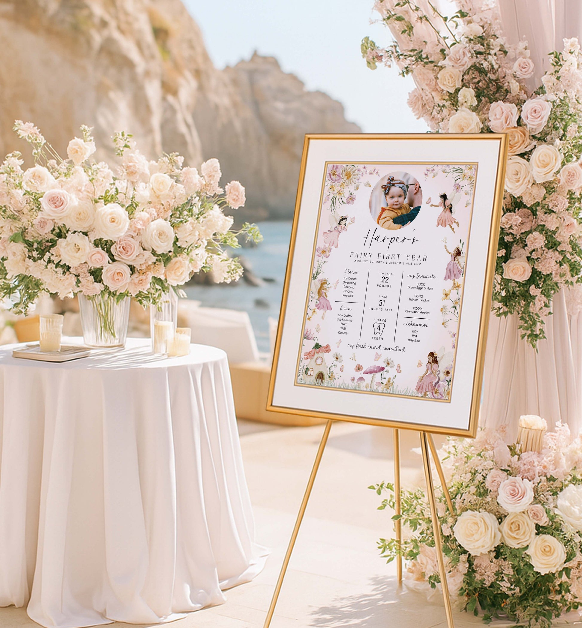Decorative setup with floral arrangements and a framed photo on a stand by a scenic location. Fairy Princess Photo First Birthday Milestone Board, Printable Babys First Year Milestone Poster, 1st Birthday 12 Months Milestone Photo Sign