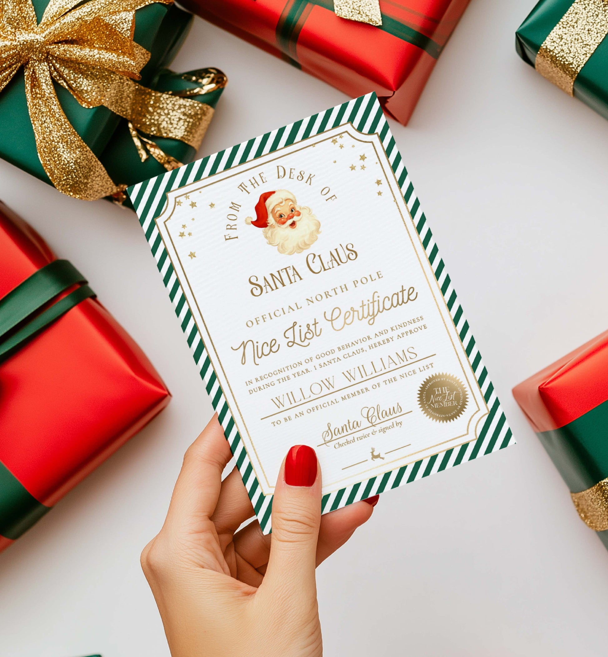 Hand holding a 'Nice List Certificate' from Santa Claus with Christmas presents in the background. Printable Nice List Certificate Template, Approved Nice List Member Letter From Santa Claus, North Pole Mail Christmas Nice List, Stripe
