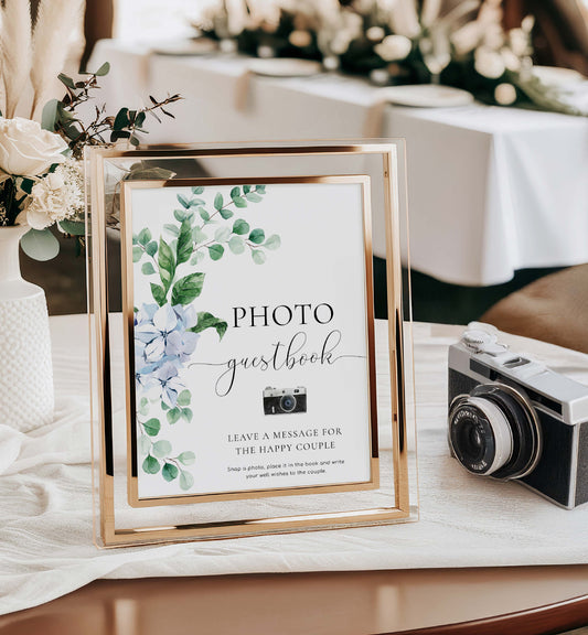 Photo guestbook with floral design and vintage camera on a table. Photo Guestbook Sign, Blue Hydrangea Floral, Wedding Guest Book Sign, Polaroid Guest Book Sign, Wedding Keepsake Guestbook Sign, Ferras