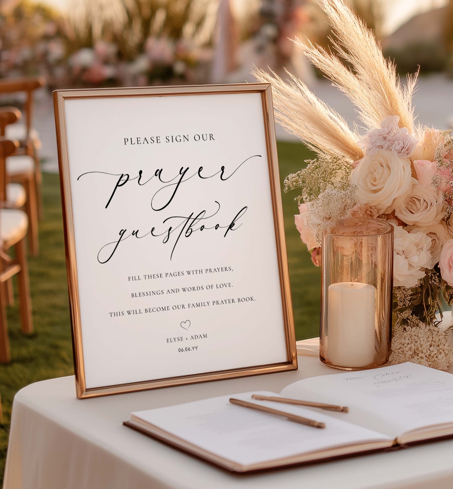 Wedding prayer guestbook with floral arrangement and candle on a table outdoors. Minimalist Wedding Prayer Guestbook Sign (Printable), Bible Guestbook