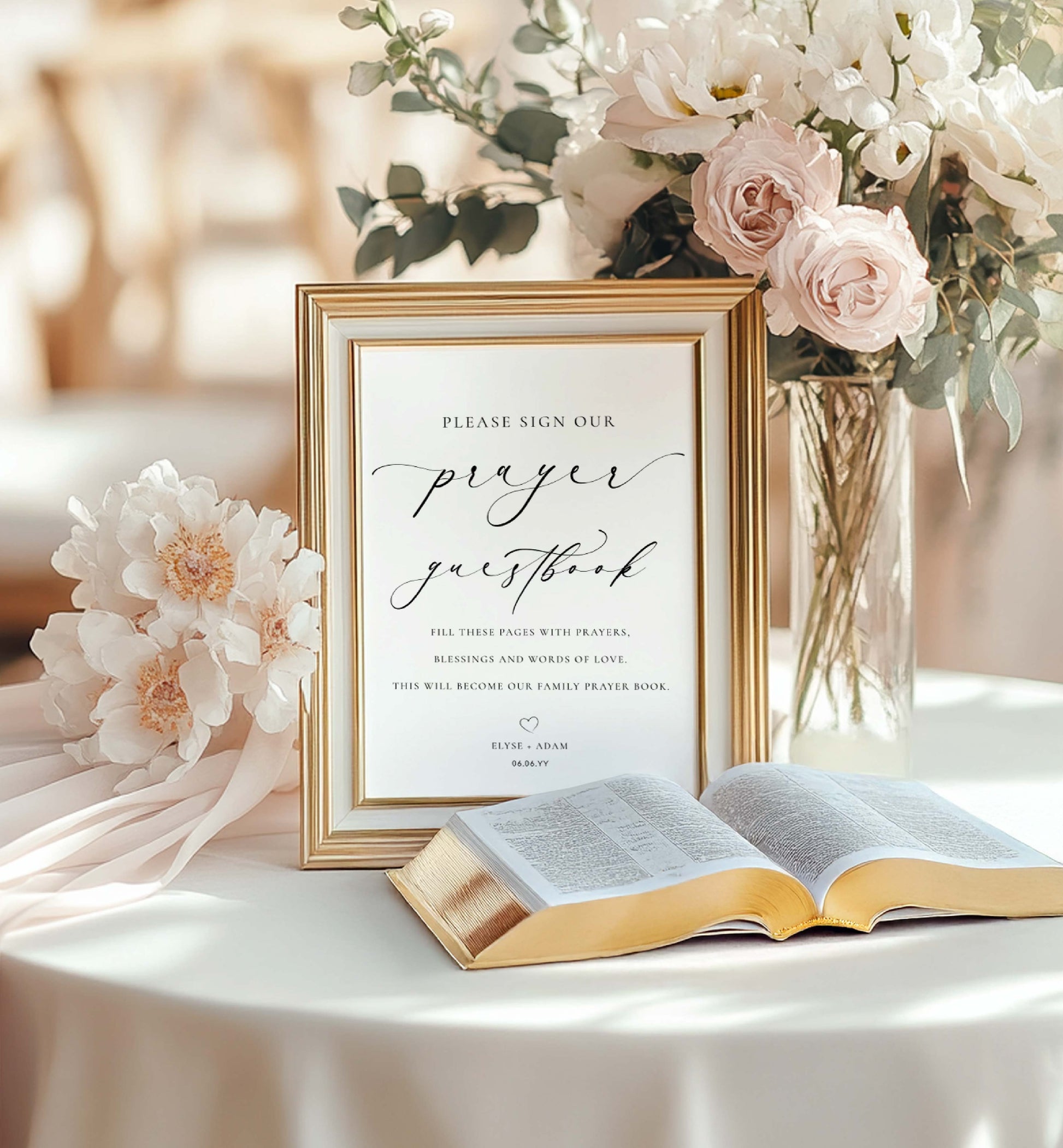 Framed wedding guestbook sign with flowers and an open book on a table. Minimalist Wedding Prayer Guestbook Sign (Printable), Bible Guestbook