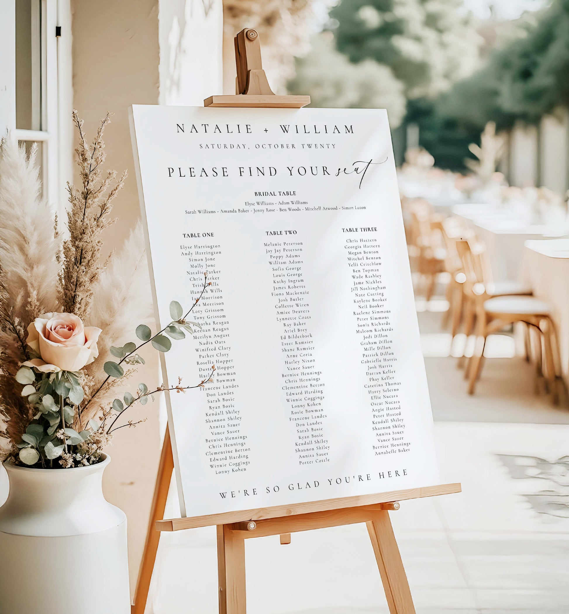 Wedding seating chart on an easel with floral decorations in an outdoor setting. Printable Wedding Table Plan Template, Minimalist Wedding Banquet Long Tables Seating Chart Template, Wedding Seating Plan Poster, Ellesmere
