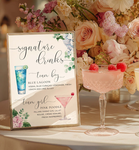 Table setting with cocktail glasses and a floral arrangement, featuring a 'signature drinks' sign. Team Girl Team Boy Drinks Menu Sign, Pink Blue Hydrangea, Printable Baby Shower Menu Bar Sign, Gender Reveal Party Drinks Sign, Ferras
