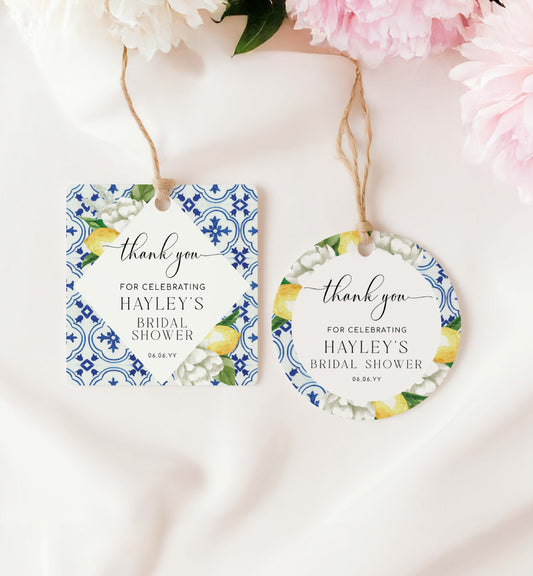 Two decorative tags with floral and lemon designs on a white background. Printable Thank You Tag, Mediterranean Blue Tile Favor Tags, Lemons Thank You Grazie Tags, Ευχαριστώ Favor Tags, The Med