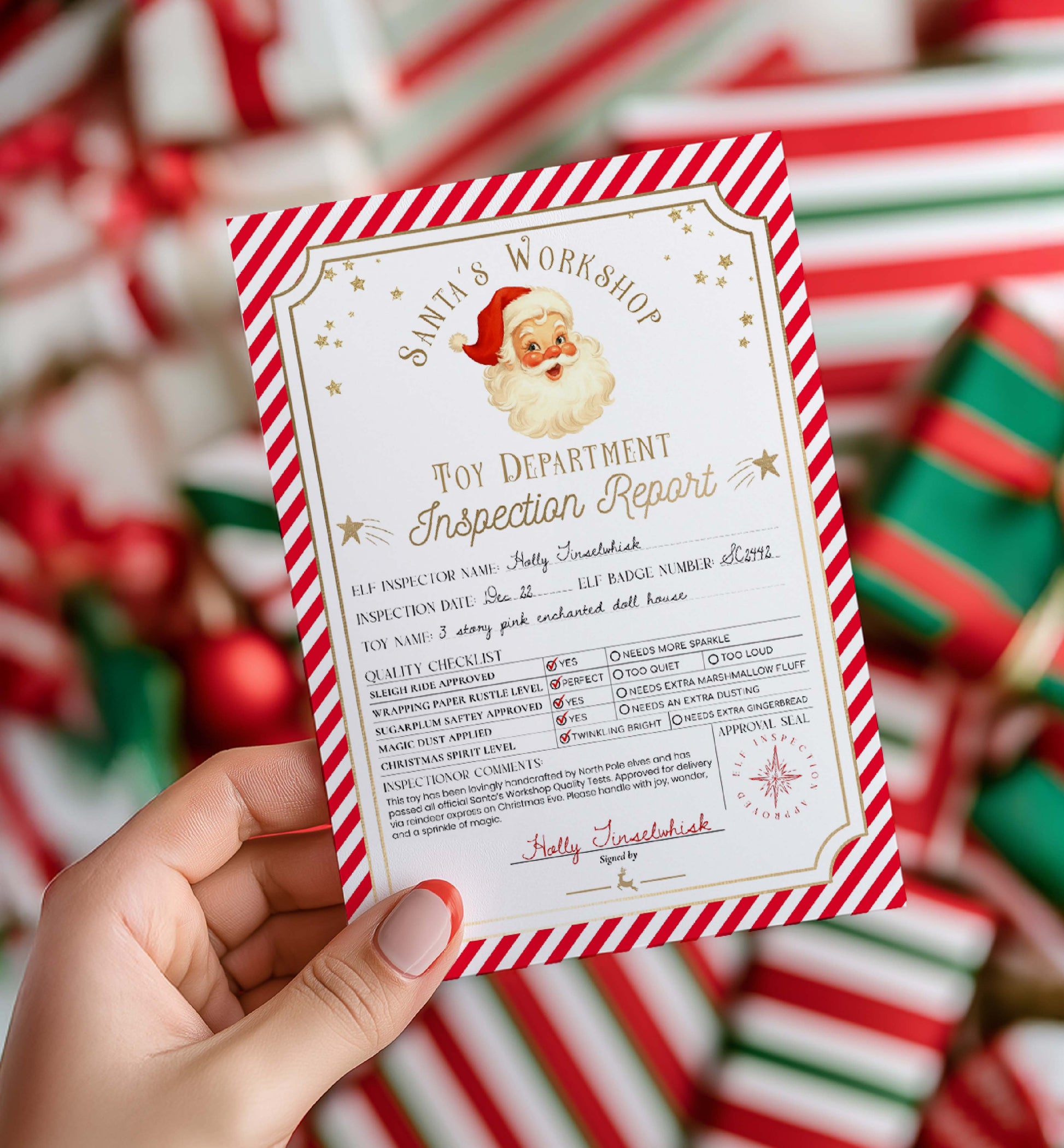 Hand holding a 'Toy Department Inspection Report' card with Santa Claus design against a festive background. Printable Santa’s Workshop Toy Inspection Report, Christmas Gift Tag, From Santa Tag, Kid's Christmas Gift, Made In The North Pole, Stripe