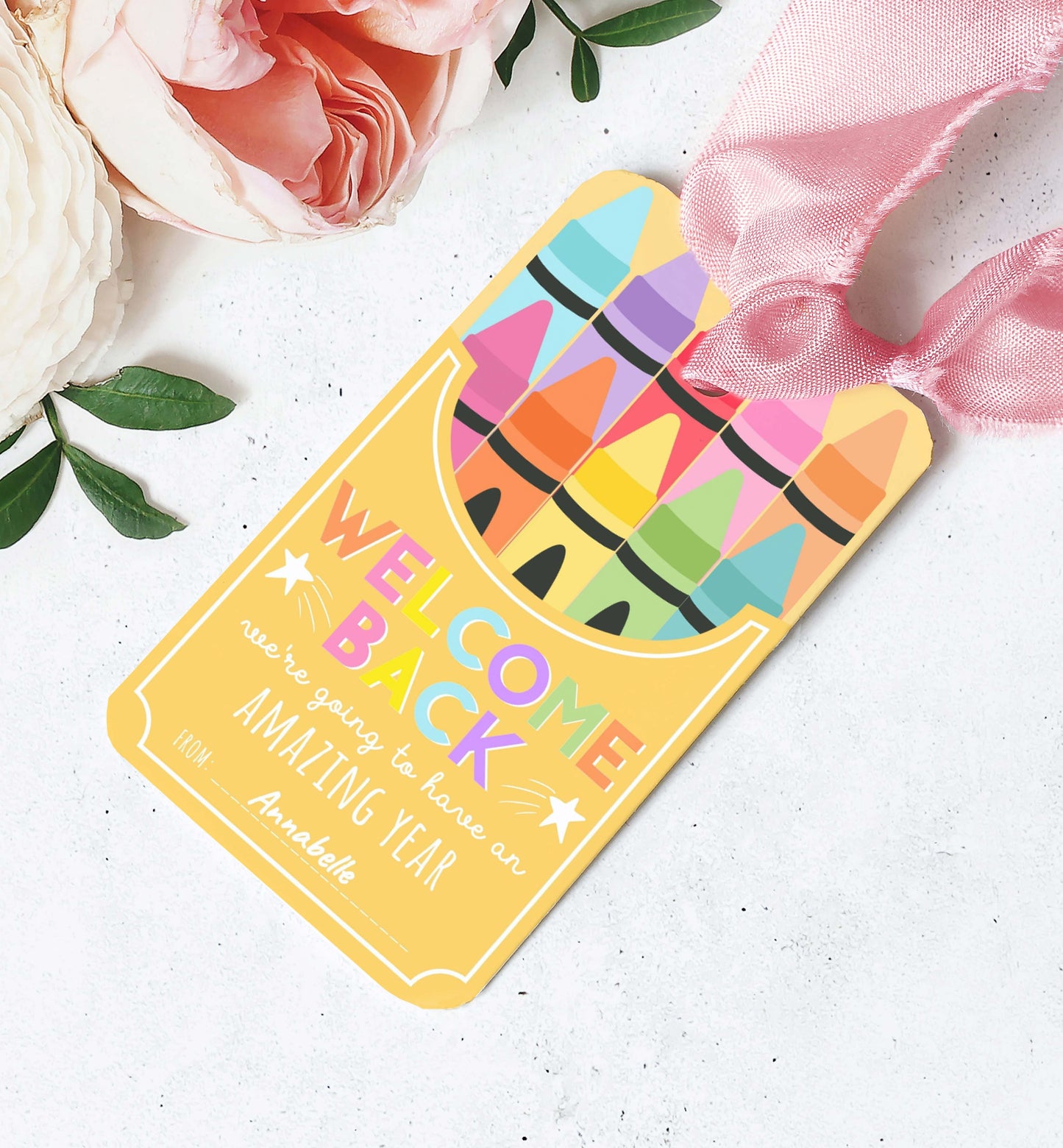Colorful 'Welcome Back' card with crayon design on a white background with flowers and ribbon. Printable Back To School Tag Template, Welcome Back To School Pencil Holder Tag, New School Year Classroom Gift, Crayon Gift