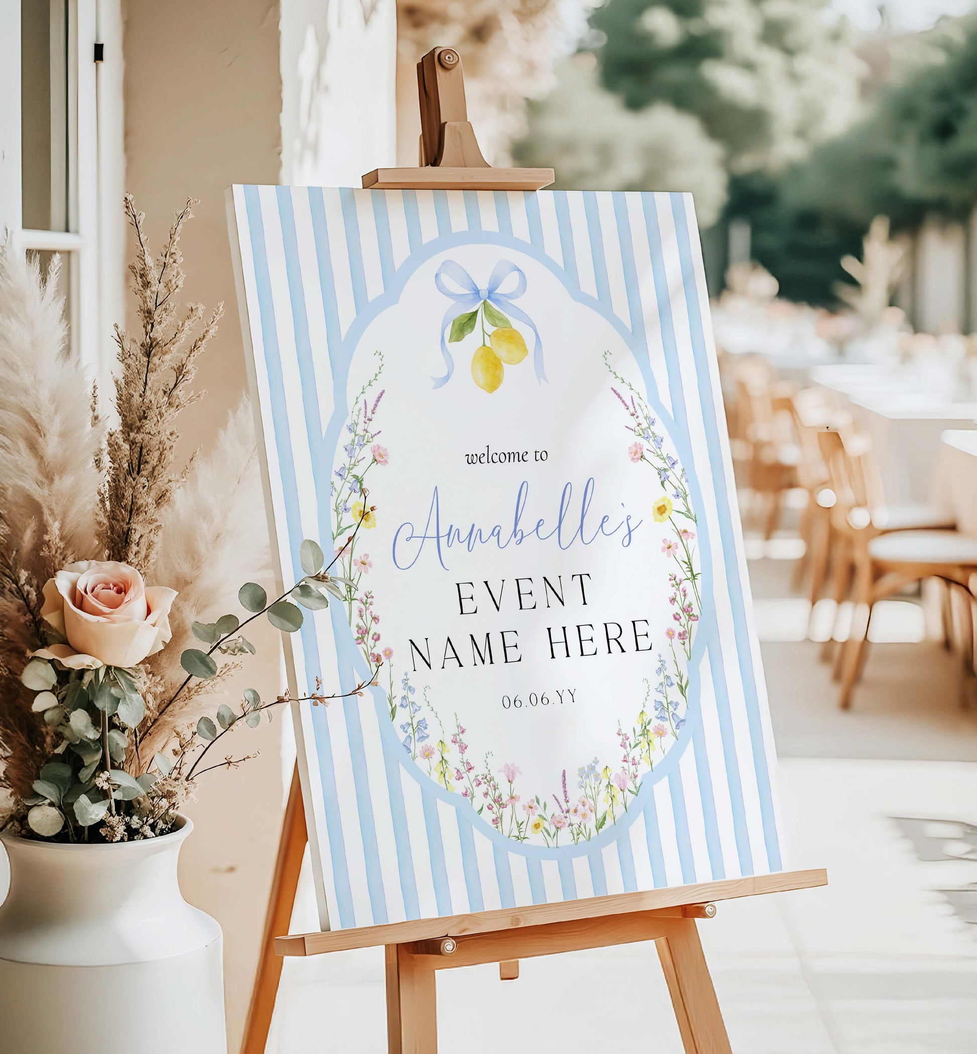 Decorative sign on an easel with floral and lemon design, set outdoors. Printable Bridal Shower Welcome Sign, Spring Wildflower, Blue Bow Ribbon, Bachelorette Party, Hens Party, Baby Shower Welcome Sign, Baby In Bloom