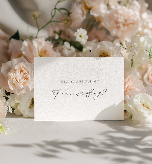Card asking 'Will you be our MC at our wedding?' surrounded by flowers on a light surface. Will You Be Our MC Card, Wedding MC Proposal Card, Minimalist Wedding Card, Wedding Proposal Card, Off White Ivory, Ellesmere