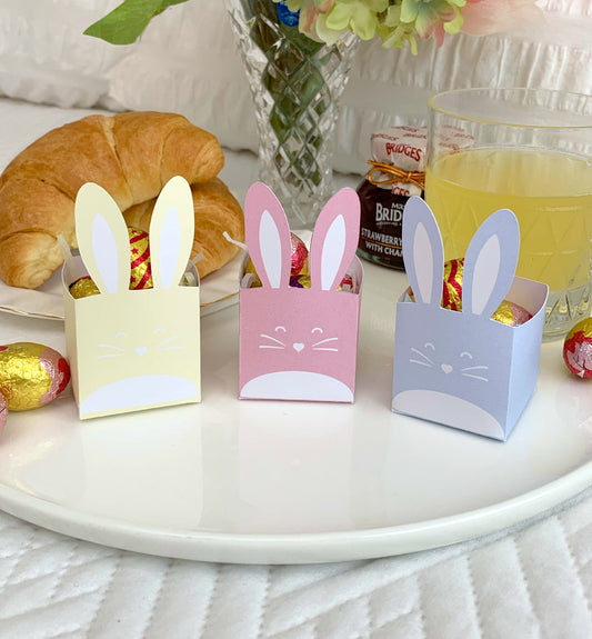 This printable box features a delightful Easter bunny design. It's the perfect size for holding small treats or goodies, making it a great option for Easter egg hunts, Easter baskets, or even just as a cute decoration on your Easter table.